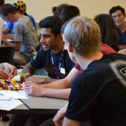students wearing ACES shirts playing games