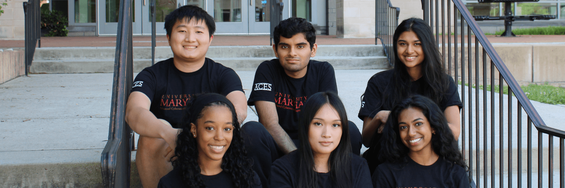 ACES students board on stairs in front of Prince Frederick Hall